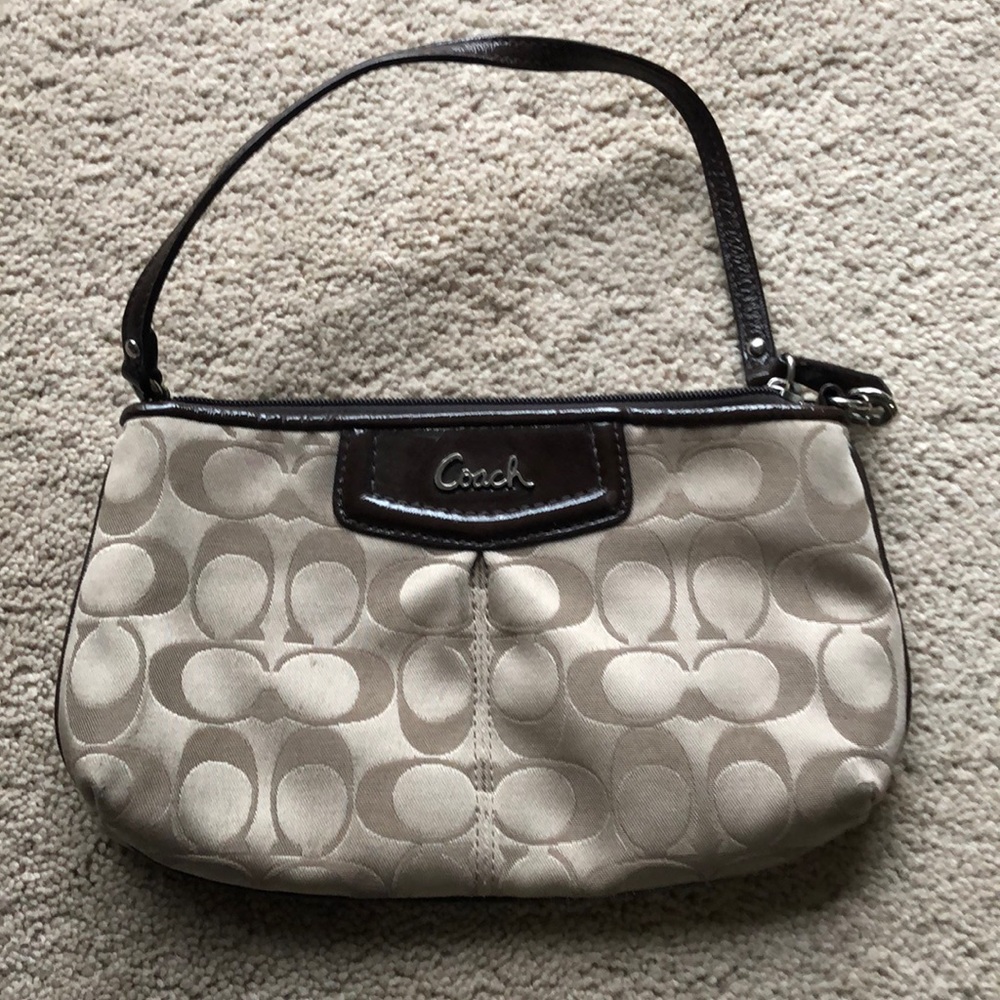 Coach Classic brown wristlet with zip closure